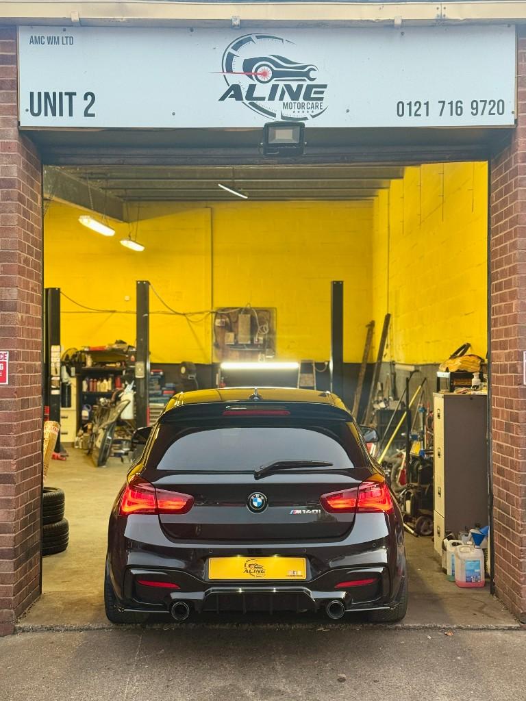 Aline Motor Care workshop bay with yellow interior and specialist equipment