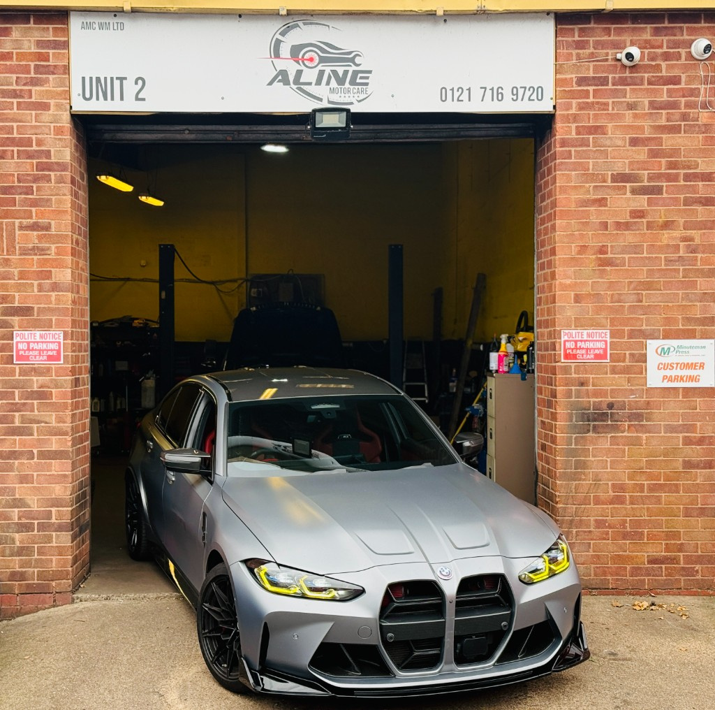 Grey BMW M3 at the Aline Motor Care Unit 2 workshop entrance, Birmingham B37